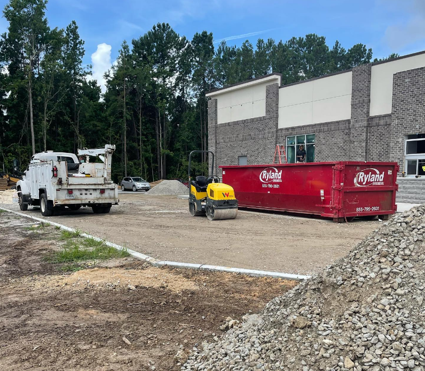 Ryland Environmental roll-off dumpster at commercial construction site in Georgia